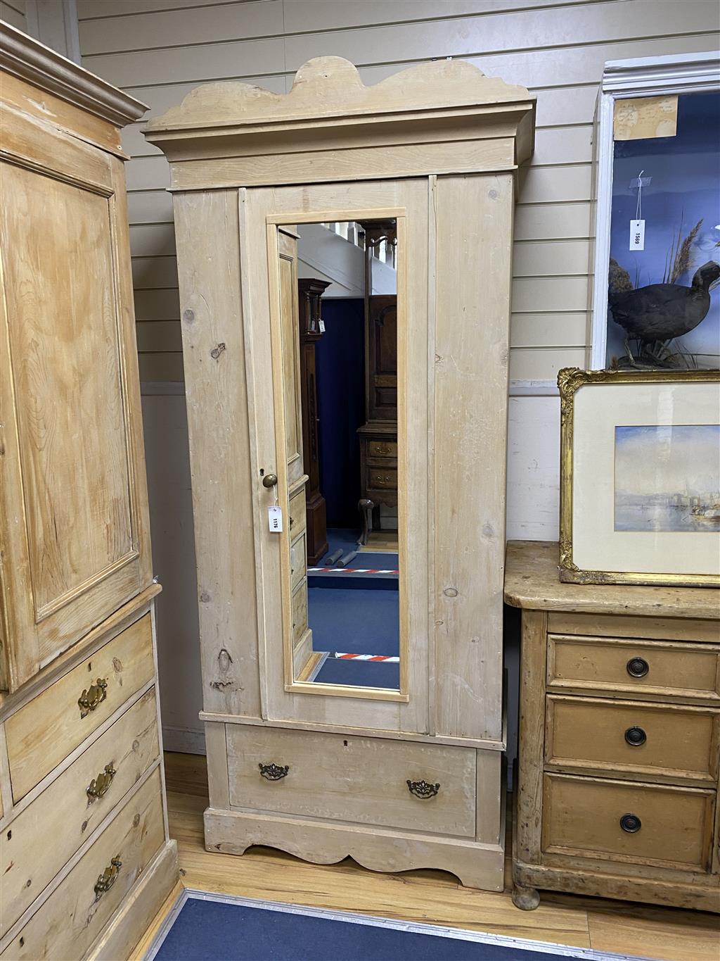 An Edwardian pine mirrored door wardrobe, length 94cm, depth 49cm, height 211cm